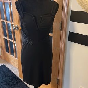 Cocktail dress with cutout sides